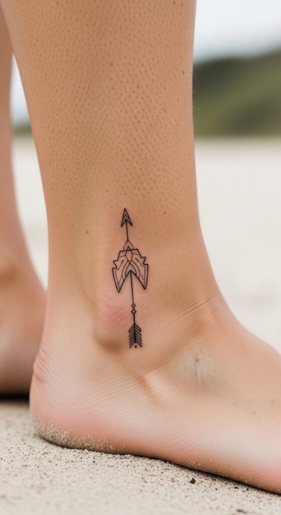 Delicate Arrowhead Ankle Tattoo