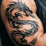 27 Fierce Tribal Dragon Tattoo Designs That Look Bold